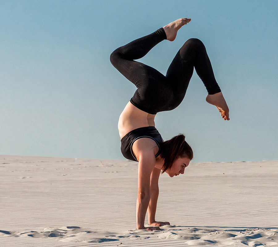 Yoga is a mind and body practice. Various styles of yoga combine physical postures, breathing techniques, and meditation or relaxation. It promotes endurance, strength, calmness, flexibility, and well-being.